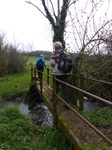 FZ004306 Hans and Machteld crossing bridge over creek.jpg